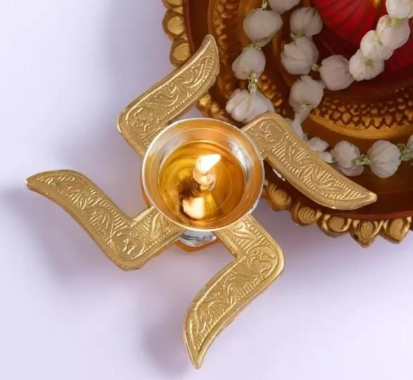 Lywire™ 🌺 Original Brass Swastik Diya | Exquisite Design for Spiritual Ambiance!